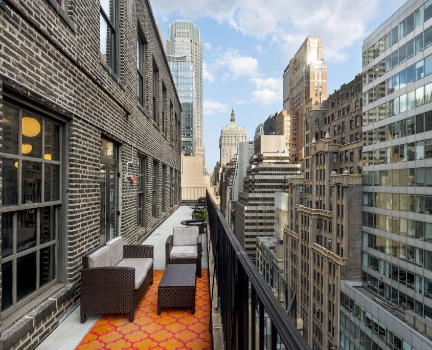 Outdoor terrace with view of midtown Manhattan